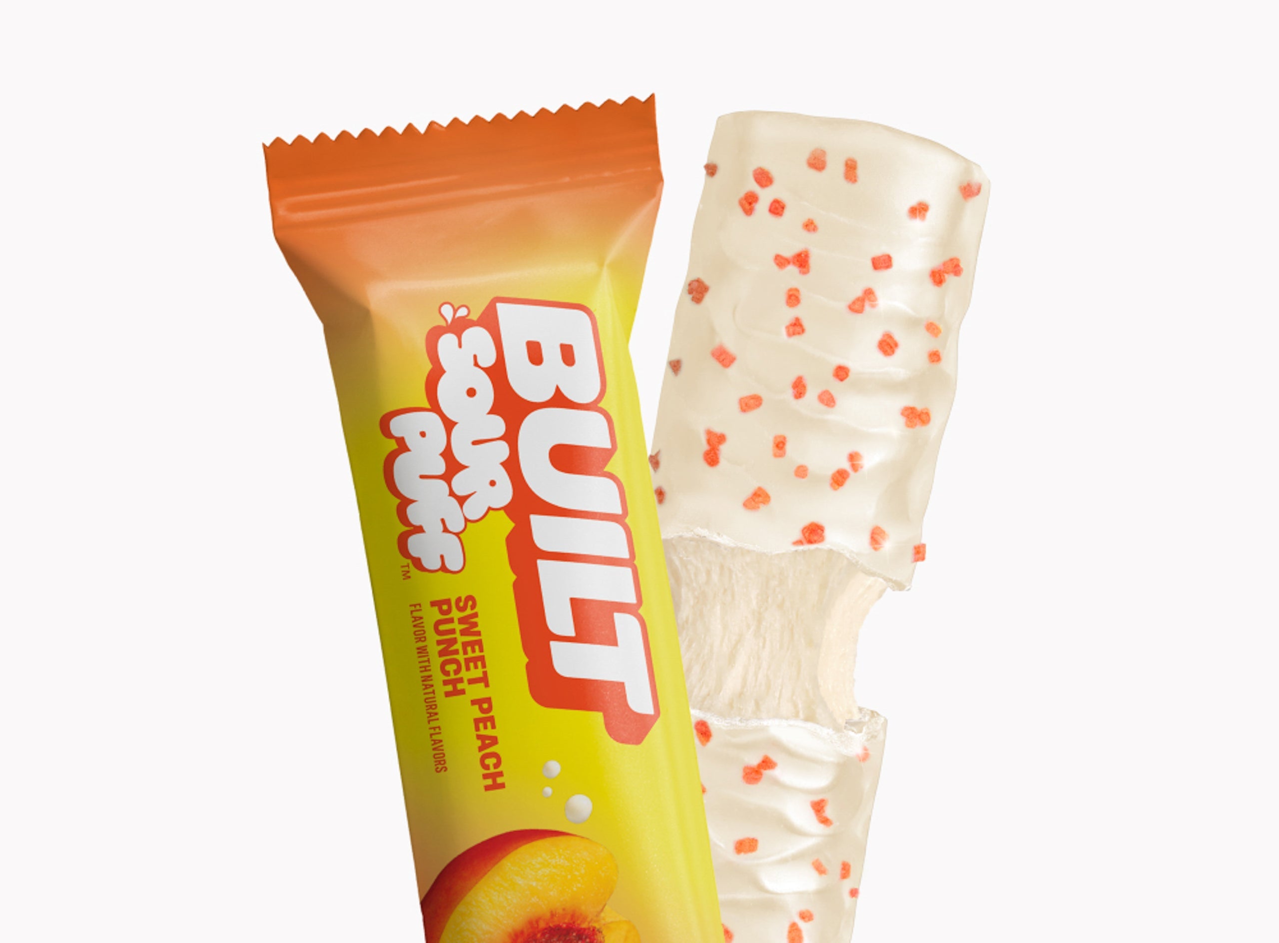 SourPuff_SweetPeachPunch_Stack_DTC_Grid_Wrapper_PuffPull_251017.jpg